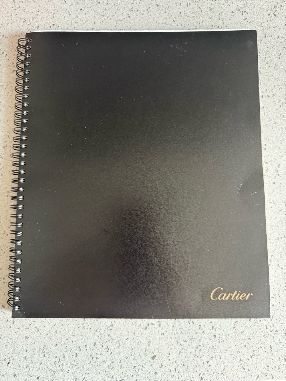 Cartier Black Notebook with Gold Logo